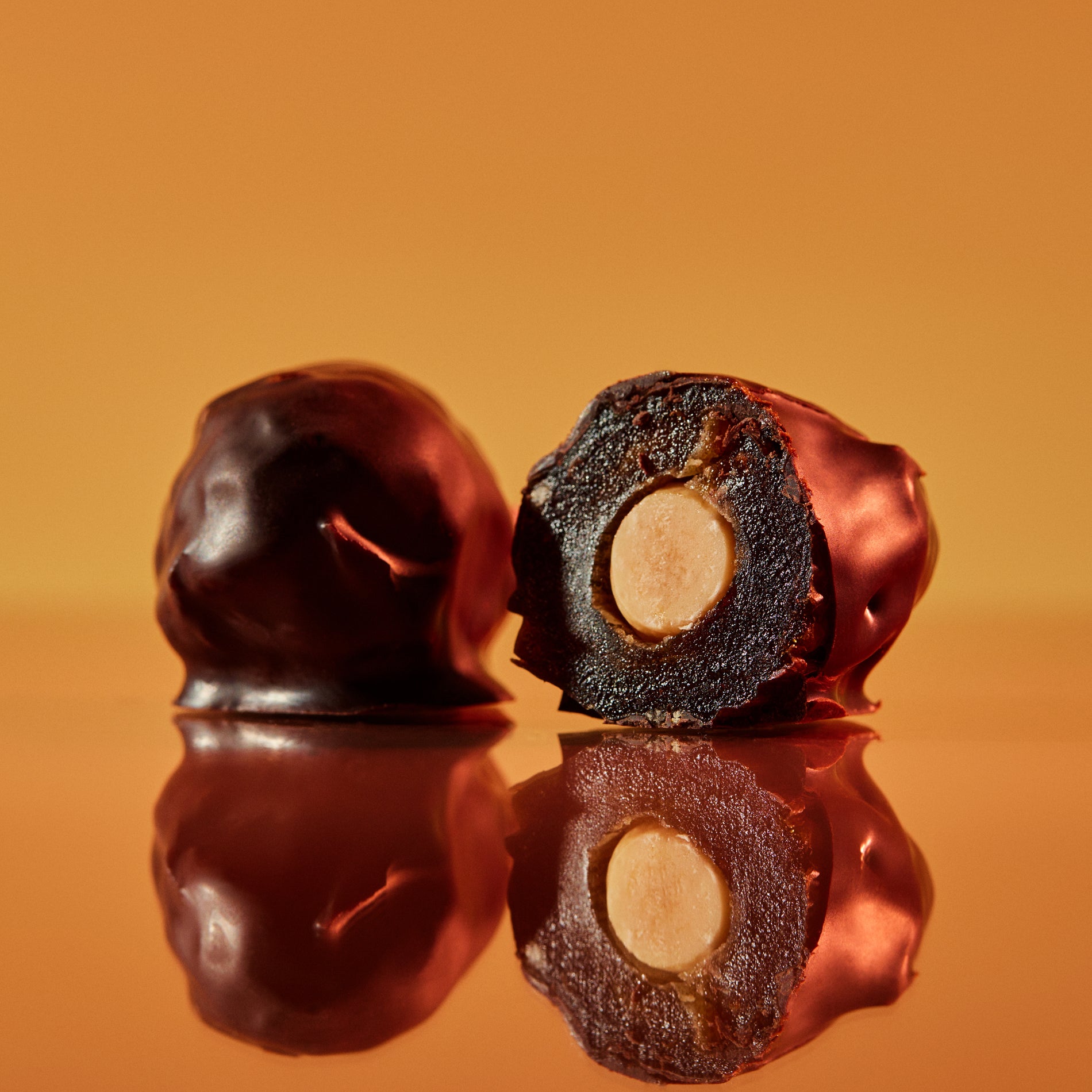 A pack of 6 medjool Dates filled with nuts covered with 100% chocolate